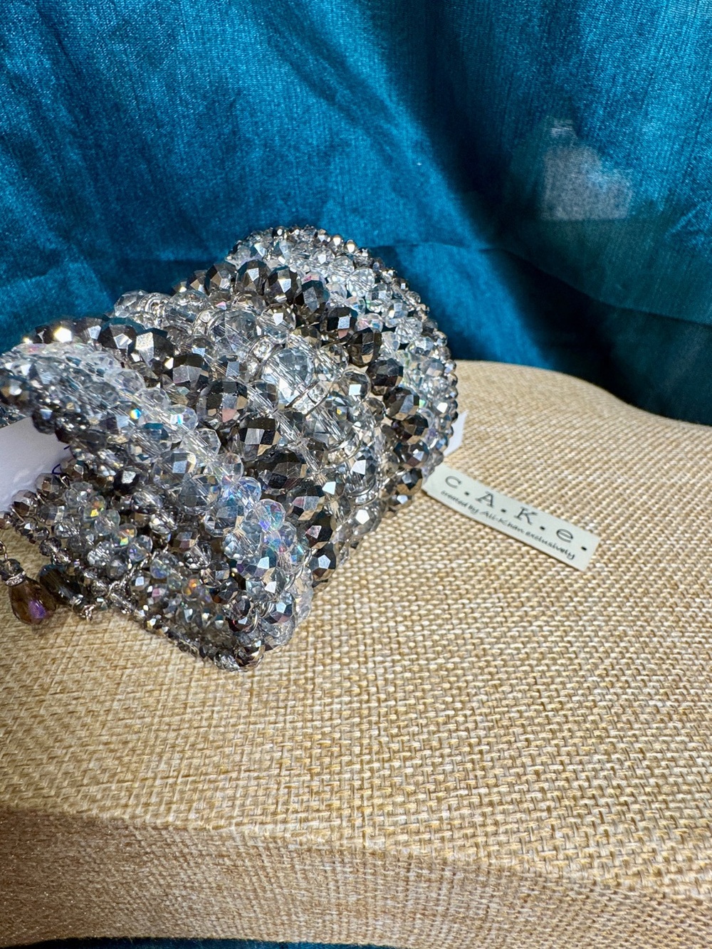c.A.K.e. Genuine Silver and Clear Crystal Memory Wire Bracelet